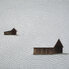 Zwei Hütten im Schnee 